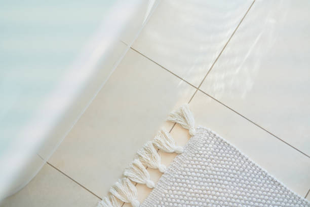 Tapis de douche d'angle : le guide pour les douches en coin